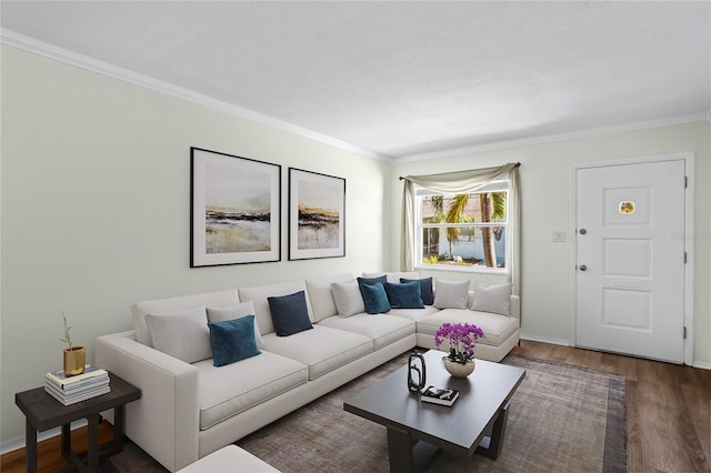 living room with ornamental molding and dark hardwood / wood-style floors