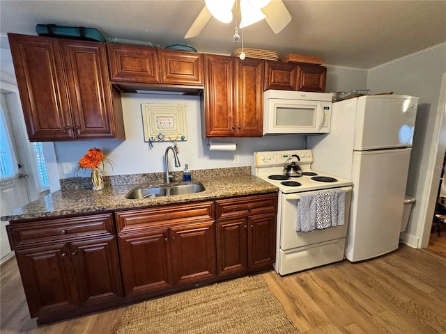 kitchen with white appliances, sink, crown molding, ceiling fan, and light wood-type flooring