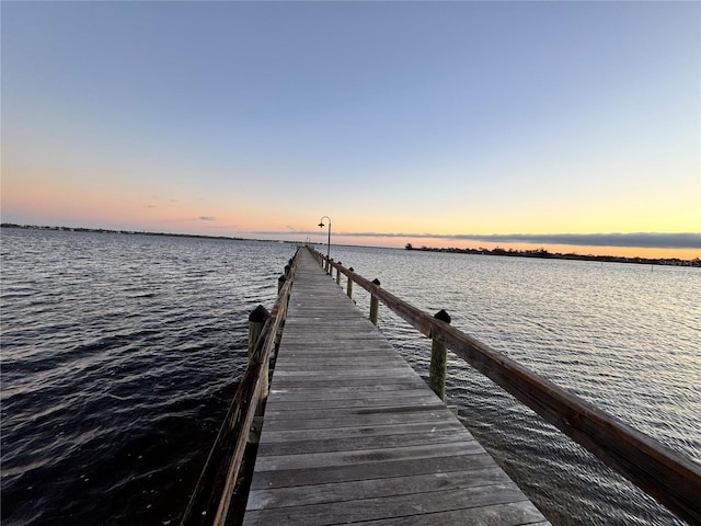 view of dock with a water view