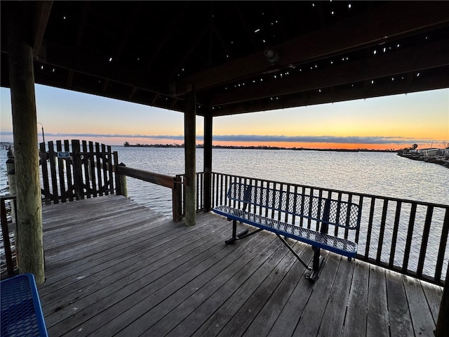 dock area featuring a gazebo and a water view