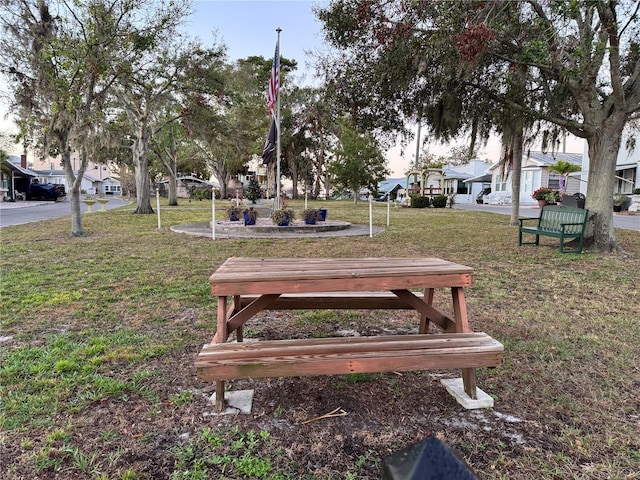 view of community featuring a lawn