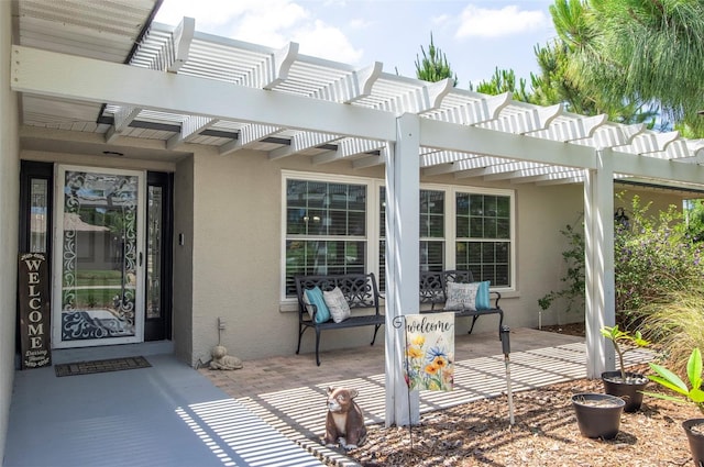 view of patio featuring a pergola