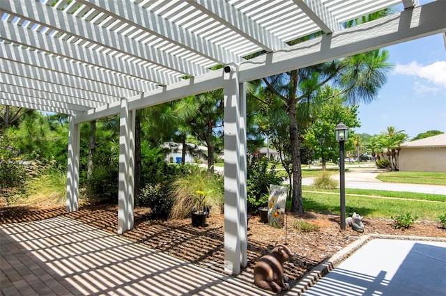 view of patio featuring a pergola