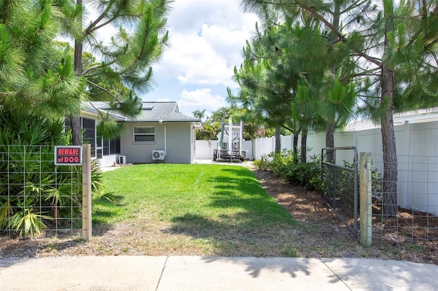 view of yard featuring central AC