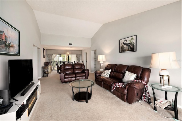 living room with lofted ceiling, light carpet, and a chandelier