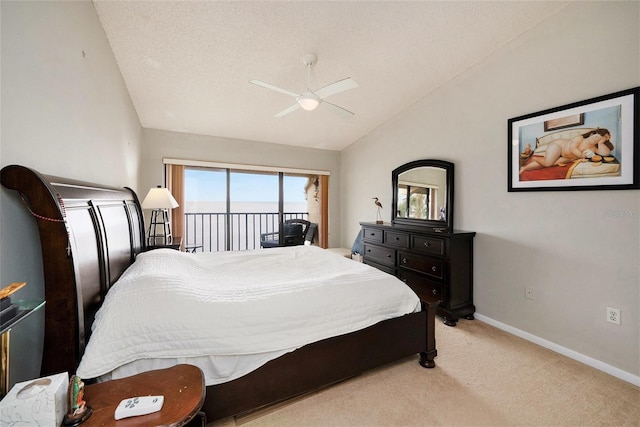 bedroom featuring ceiling fan, lofted ceiling, access to exterior, and light colored carpet