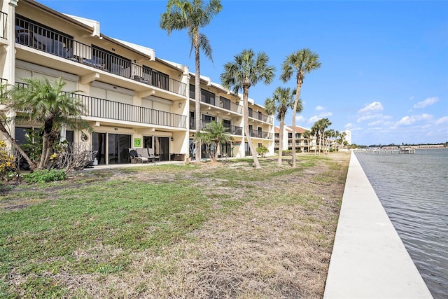 view of building exterior featuring a water view