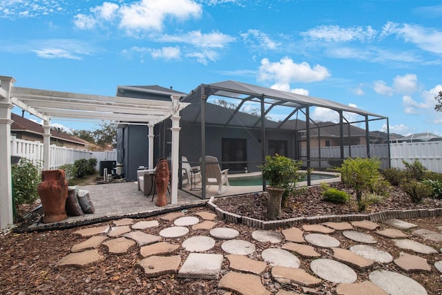 exterior space featuring a fenced in pool, a patio area, and a lanai