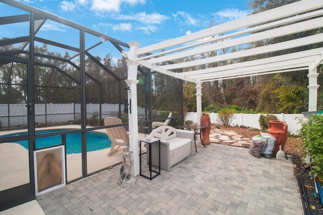 view of patio featuring a fenced in pool and glass enclosure