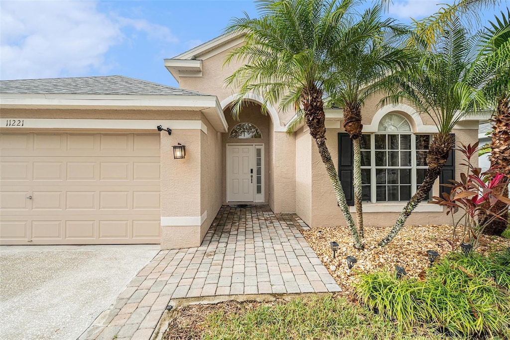 entrance to property featuring a garage