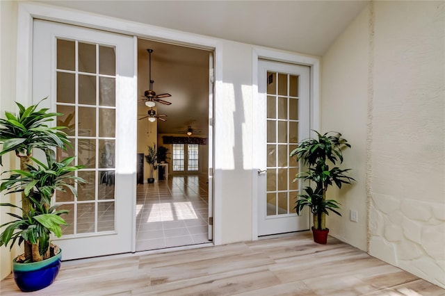 entrance to property with stucco siding