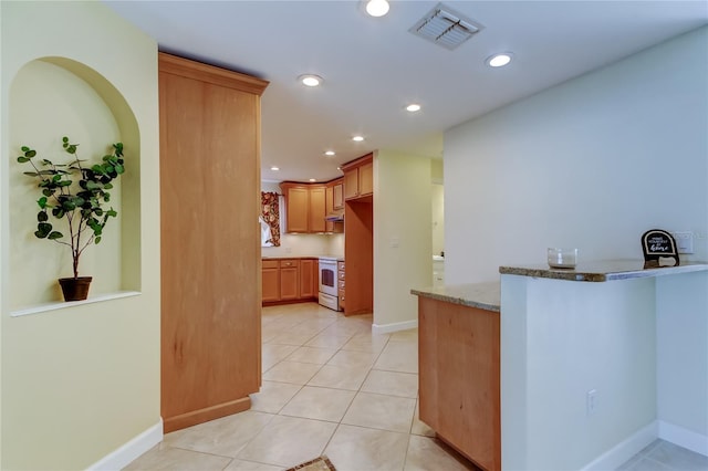 kitchen with visible vents, light stone countertops, recessed lighting, light tile patterned flooring, and white electric range