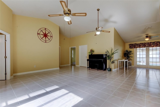 unfurnished living room featuring light tile patterned floors, french doors, baseboards, and high vaulted ceiling