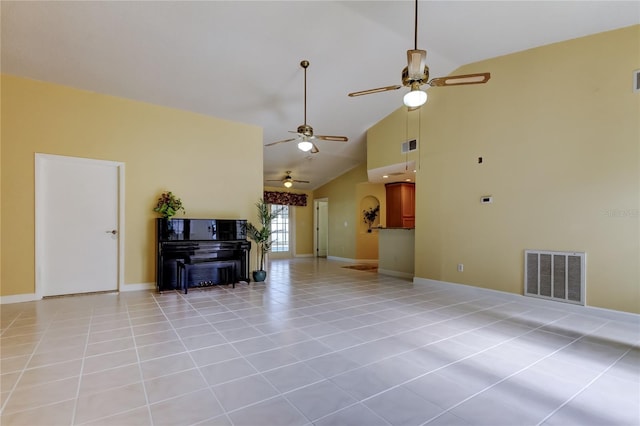 unfurnished living room with light tile patterned floors, visible vents, baseboards, and high vaulted ceiling