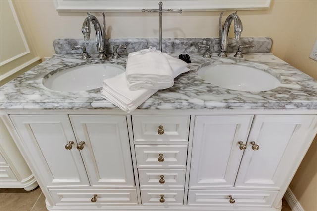 bathroom featuring vanity and tile patterned flooring