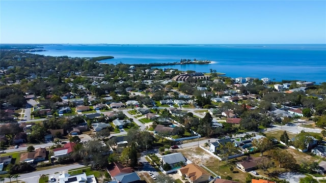 birds eye view of property with a residential view and a water view