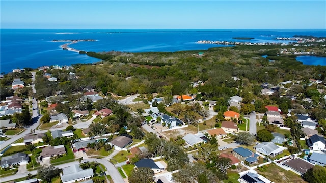 bird's eye view with a water view and a residential view