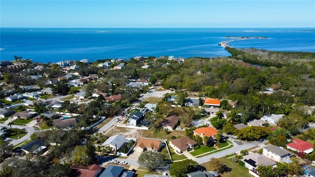 birds eye view of property featuring a residential view and a water view