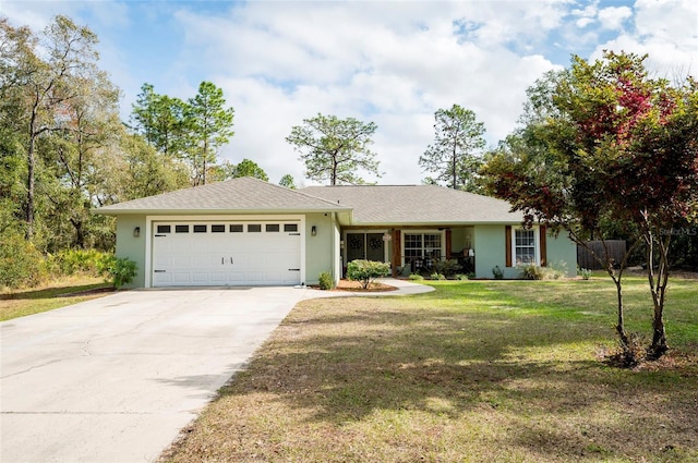 ranch-style house with a garage and a front yard