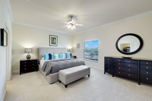 bedroom with light carpet, ceiling fan, and ornamental molding