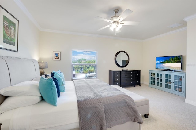 bedroom with ceiling fan, light colored carpet, and ornamental molding