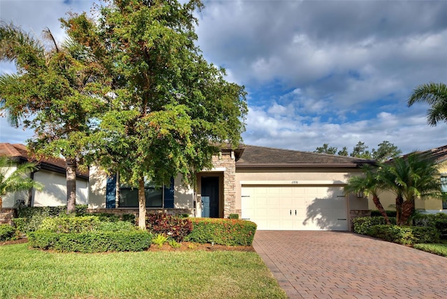 view of front of home with a garage