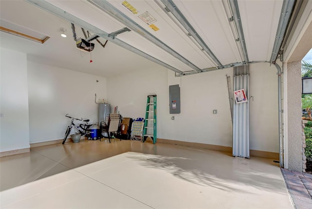 garage featuring electric water heater, electric panel, and a garage door opener