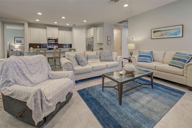 living room featuring light tile patterned floors