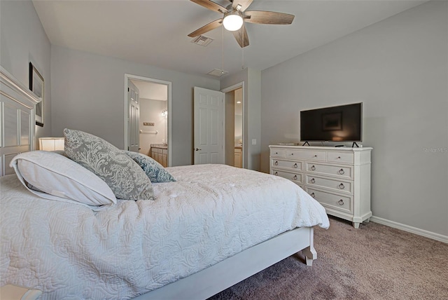 bedroom featuring carpet flooring, ceiling fan, and ensuite bathroom