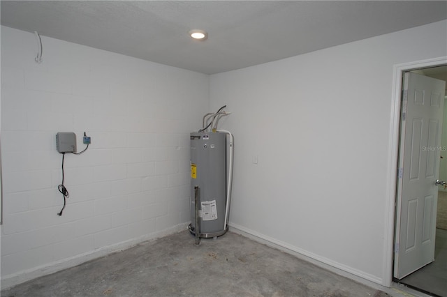 utility room featuring electric water heater