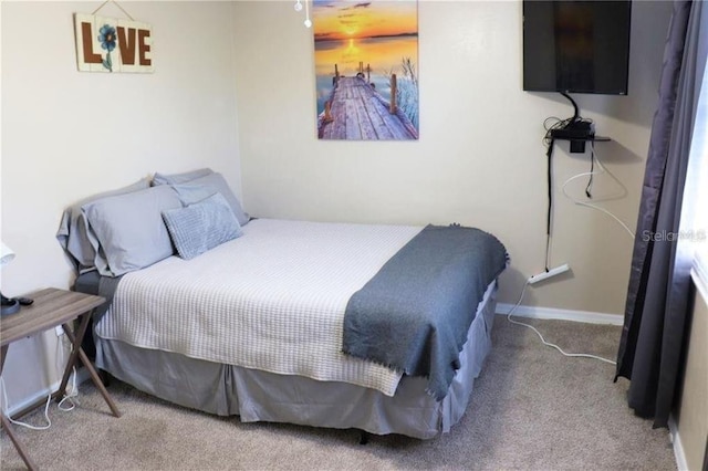 bedroom featuring carpet flooring