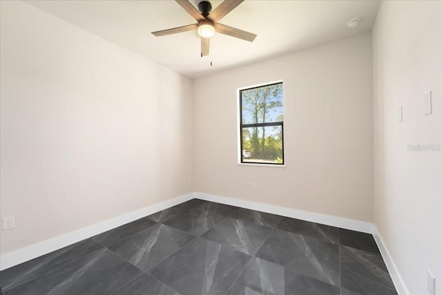 empty room featuring ceiling fan