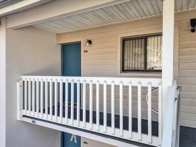 doorway to property featuring a balcony