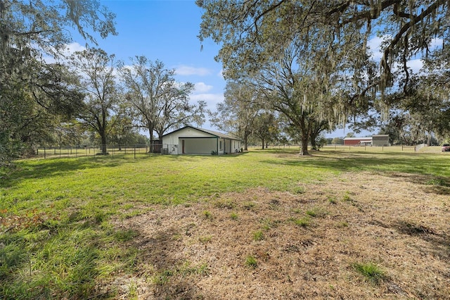 view of yard with a rural view