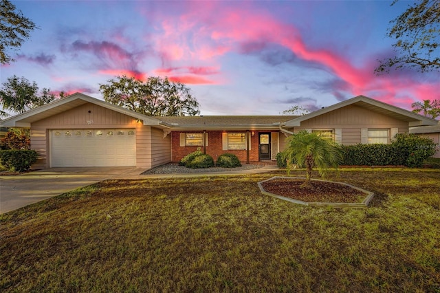 single story home with a garage