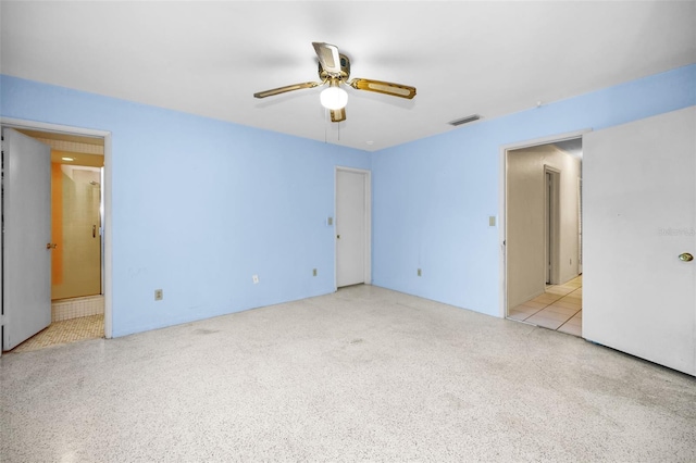 unfurnished bedroom with ceiling fan and light tile patterned floors