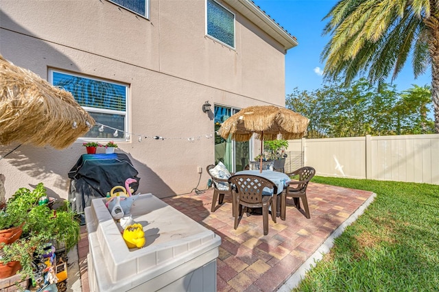 view of patio with a grill