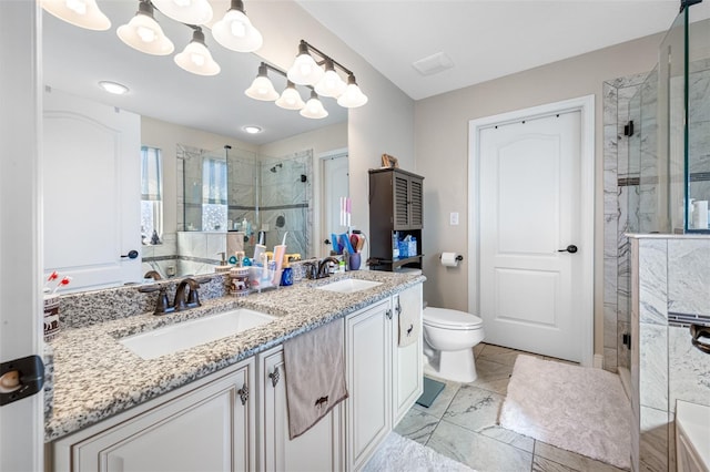 bathroom featuring vanity, toilet, and walk in shower