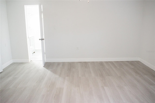 empty room featuring light hardwood / wood-style floors