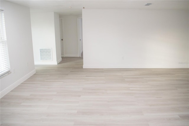 empty room featuring light hardwood / wood-style floors