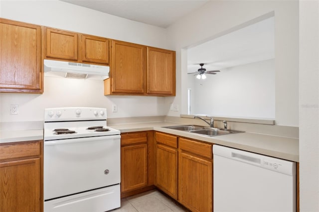 kitchen featuring ceiling fan, white appliances, sink, and light tile patterned floors