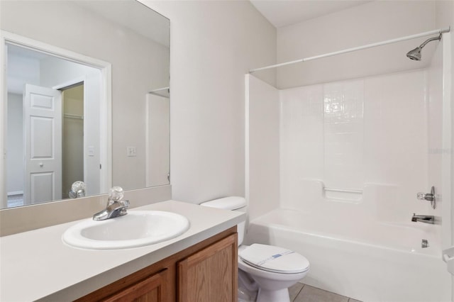 full bathroom featuring tile patterned floors, vanity,  shower combination, and toilet