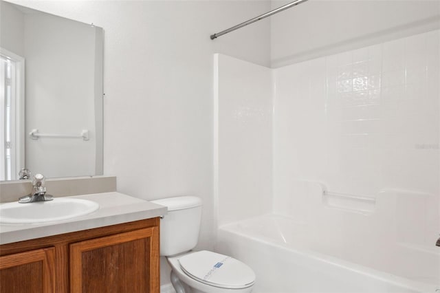 full bathroom featuring vanity, shower / bath combination, and toilet