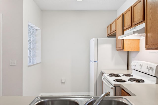 kitchen with white range with electric stovetop