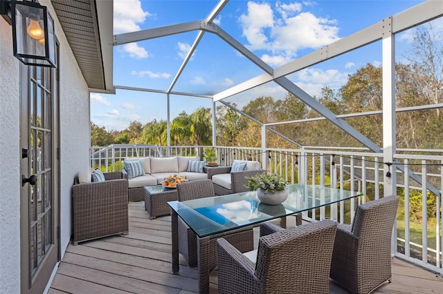 wooden deck with an outdoor living space