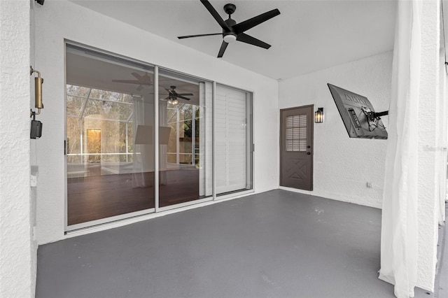 view of patio / terrace featuring ceiling fan