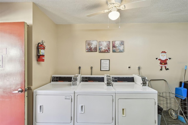 washroom with washer and clothes dryer, ceiling fan, and a textured ceiling