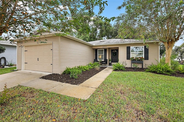 ranch-style home with a garage and a front yard