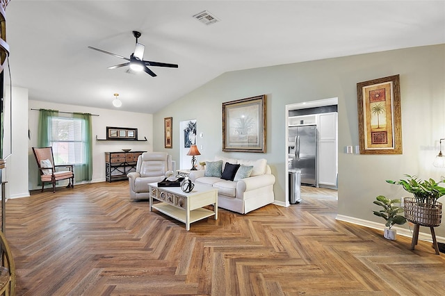 living room with light parquet flooring, vaulted ceiling, and ceiling fan