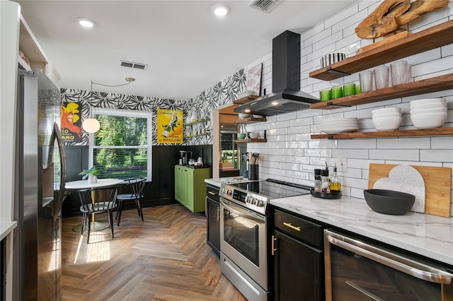 kitchen with beverage cooler, light stone counters, dark parquet floors, range hood, and appliances with stainless steel finishes